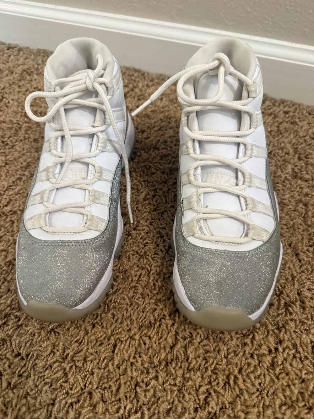 Jordan's size 7 White and Silver Glitter Low-Top Sneakers